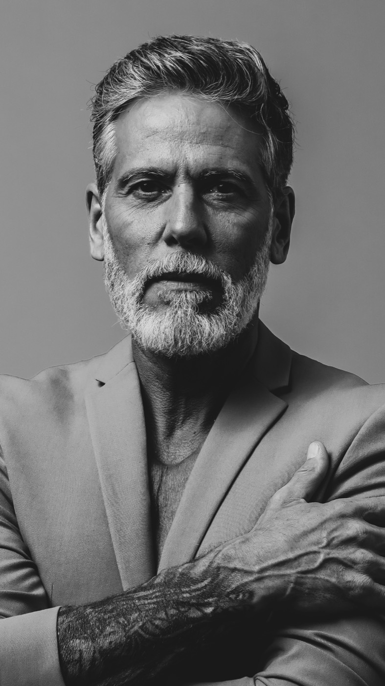 Composite executive — patriarch-with-presence archetype